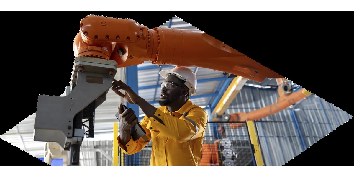 RS Group PLC engineer inspecting industrial equipment on the factory floor
